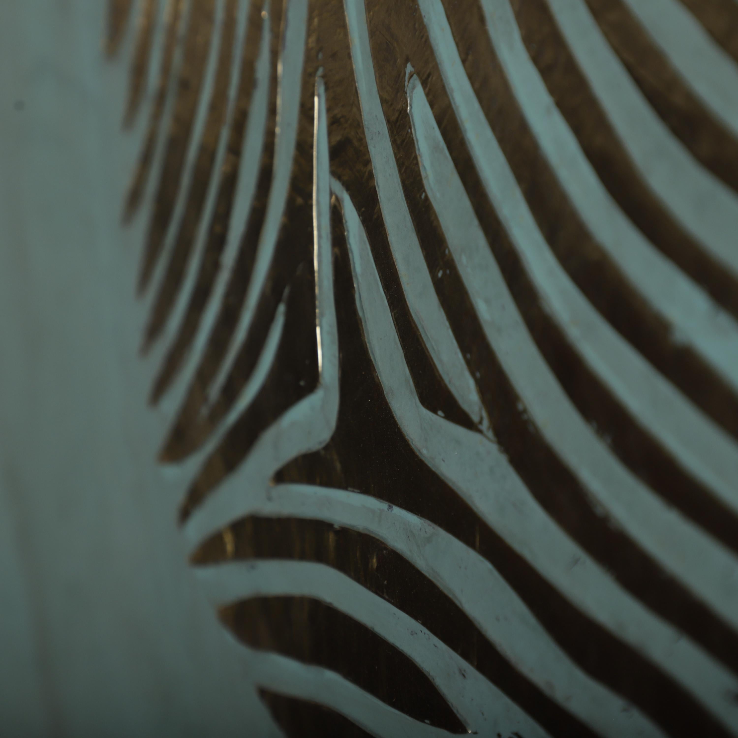 a close-up view of a zebra-like pattern on a surface, with a dark background.