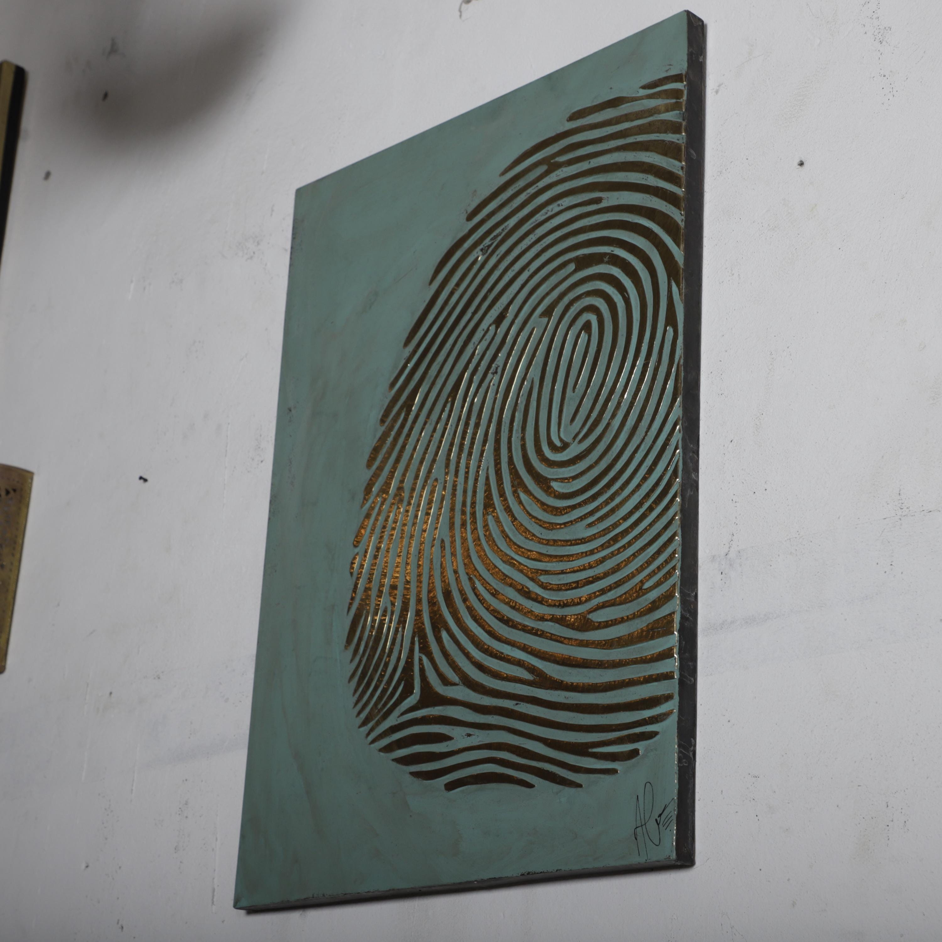 a piece of art that depicts a fingerprint on a green background.