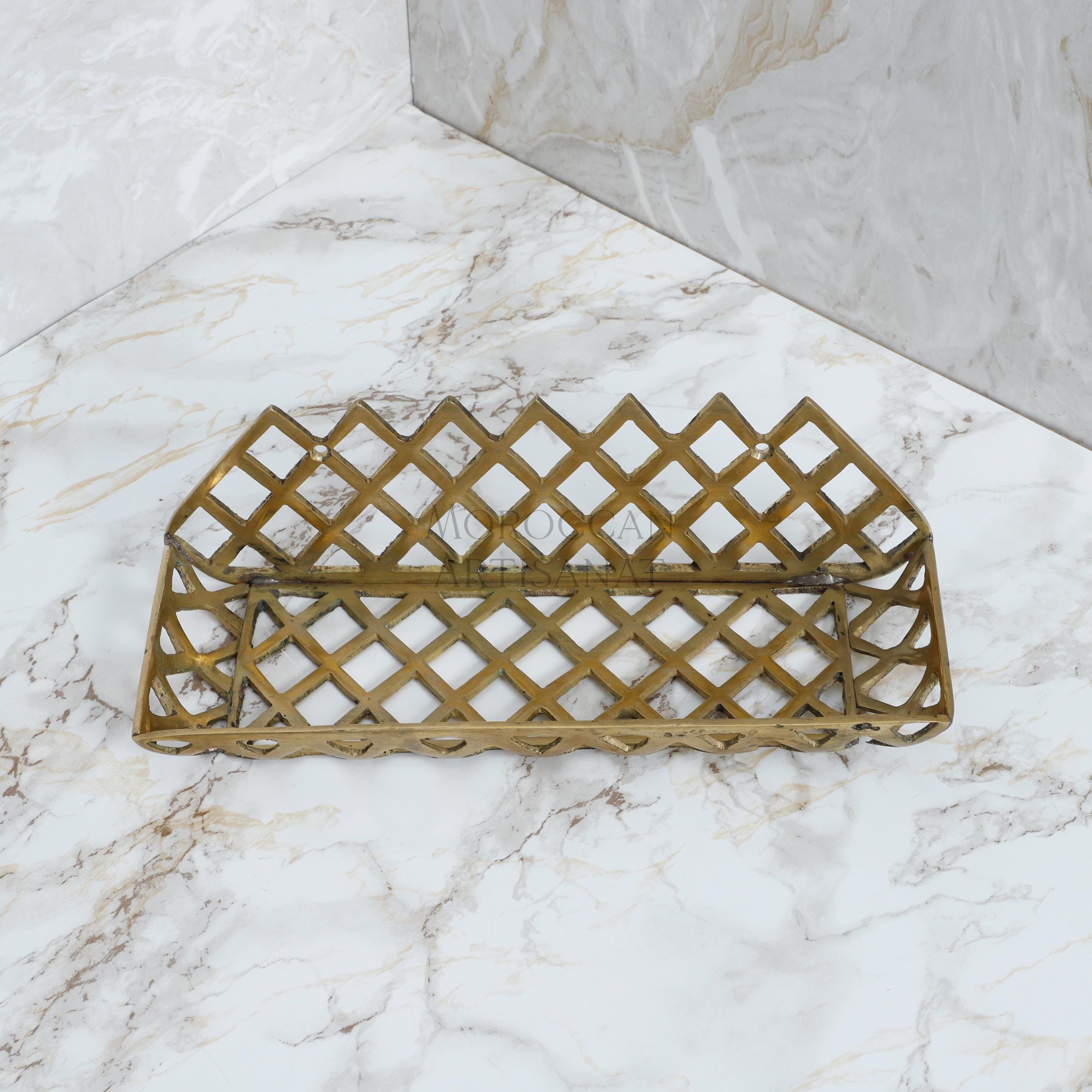a metal tray sitting on top of a marble counter