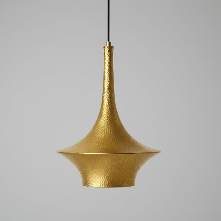 A gold-colored pendant light fixture with a textured, metallic finish hangs from the ceiling.