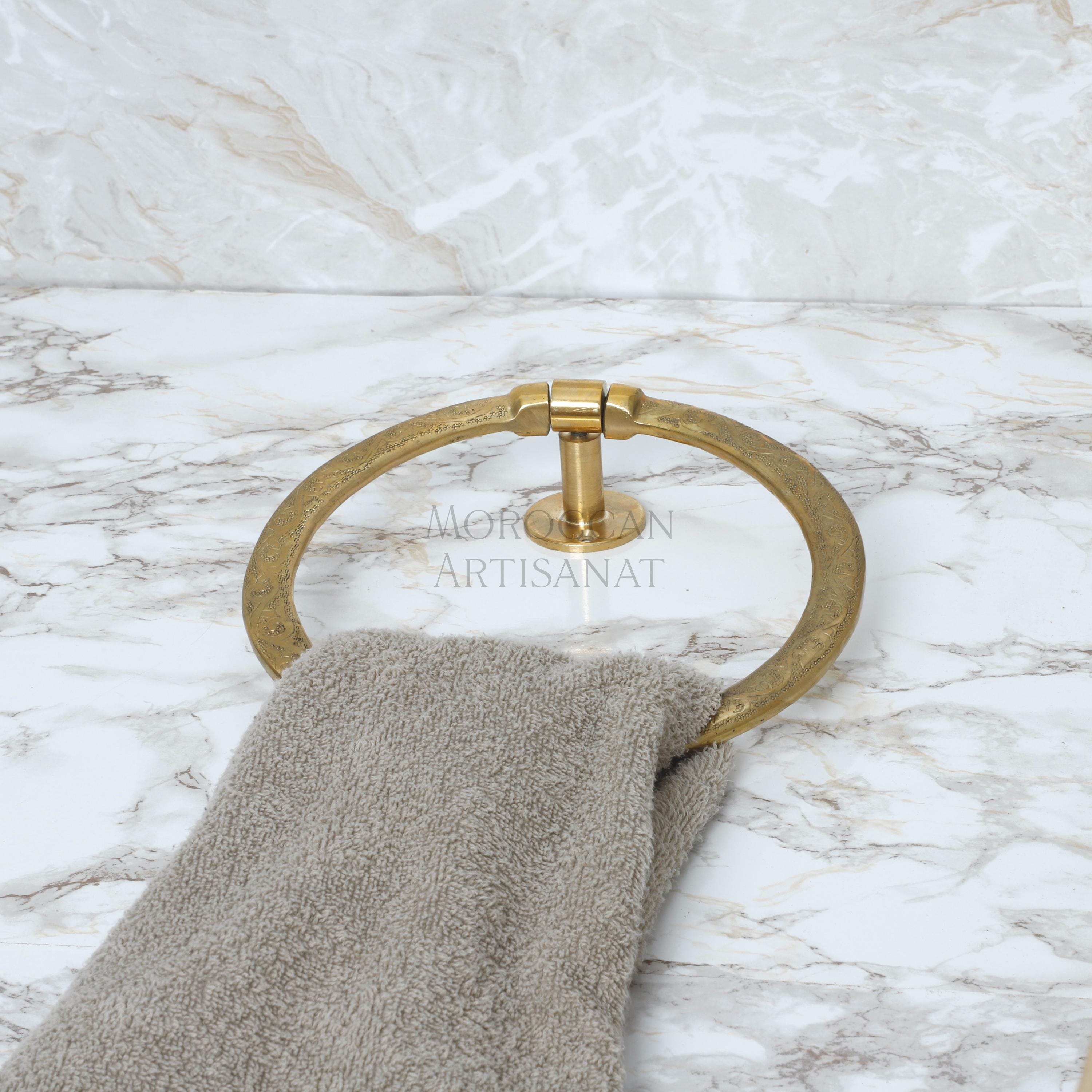 a towel ring on a marble counter top