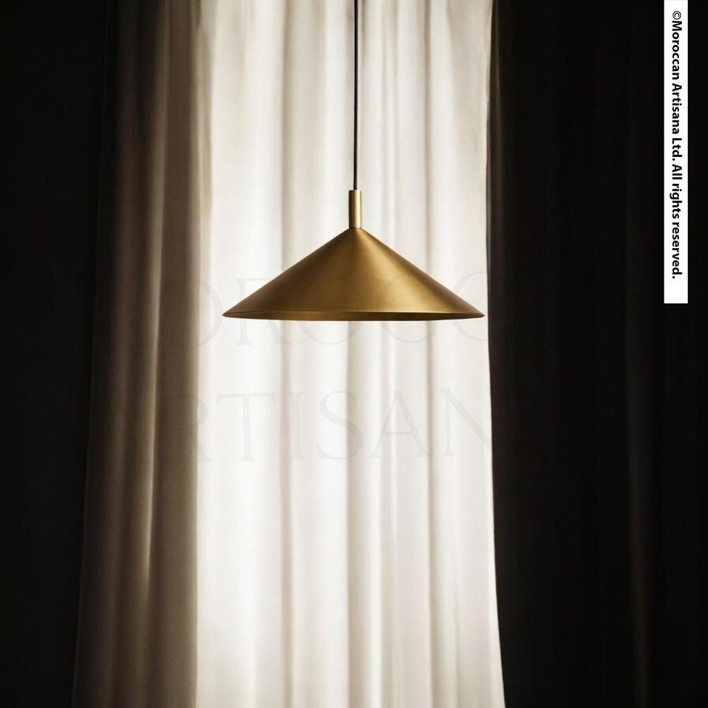 A gold pendant lamp hangs from the ceiling, casting a warm glow in the room.