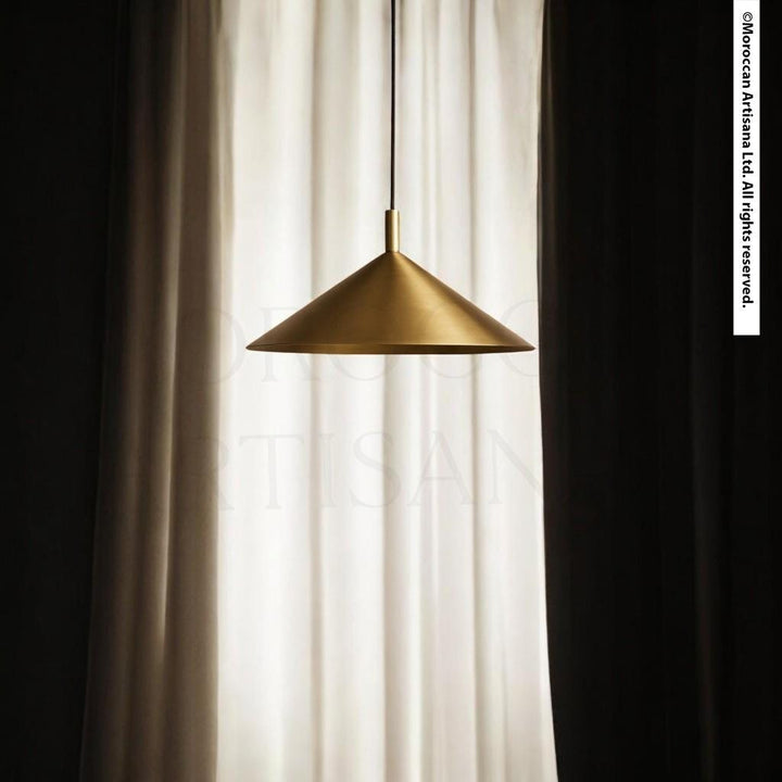 A gold pendant lamp hangs from the ceiling, casting a warm glow in the room.