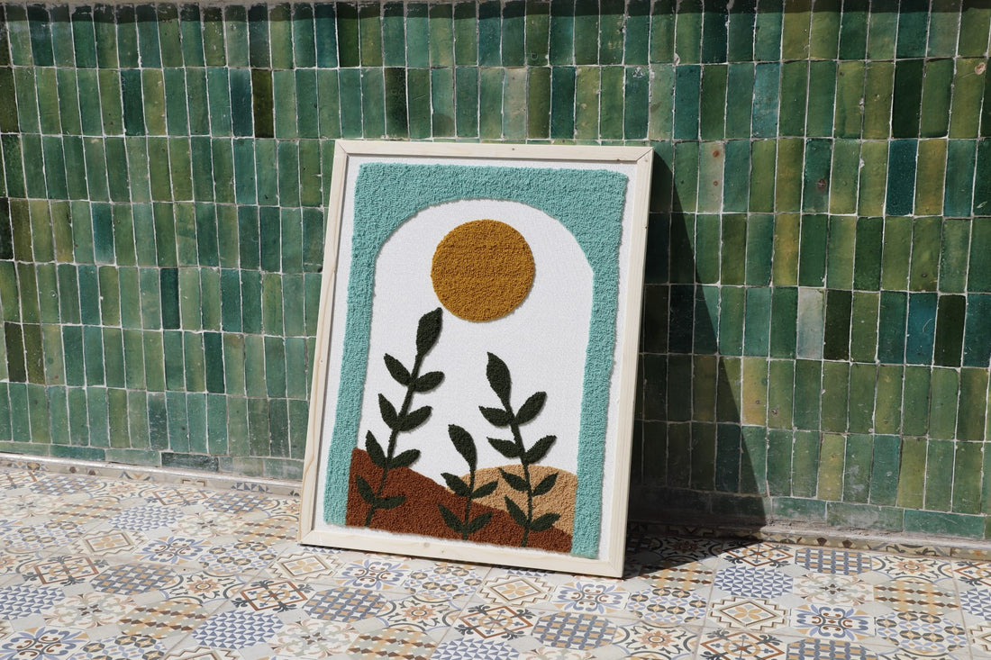 Framed textile wall art with abstract fabric design.