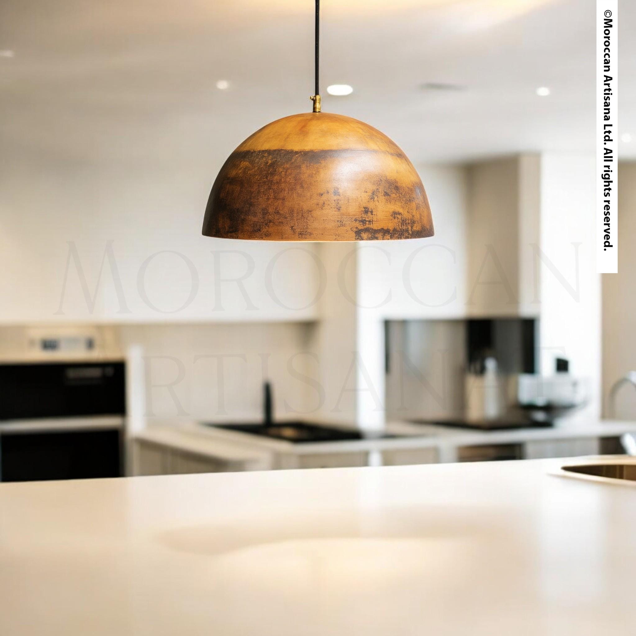 a modern kitchen with a large, rustic-looking light fixture hanging from the ceiling.