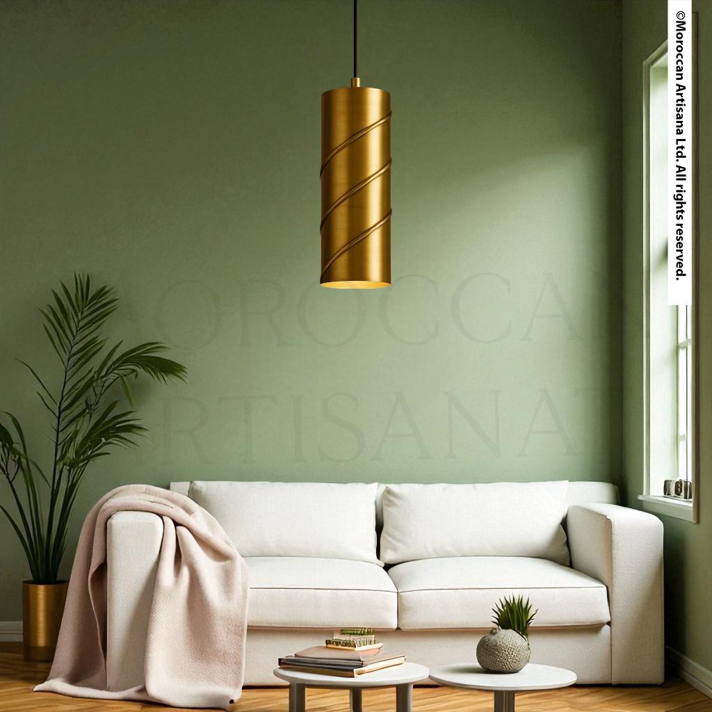 a modern living room with a white sofa, a potted plant, and a gold pendant light hanging above it.