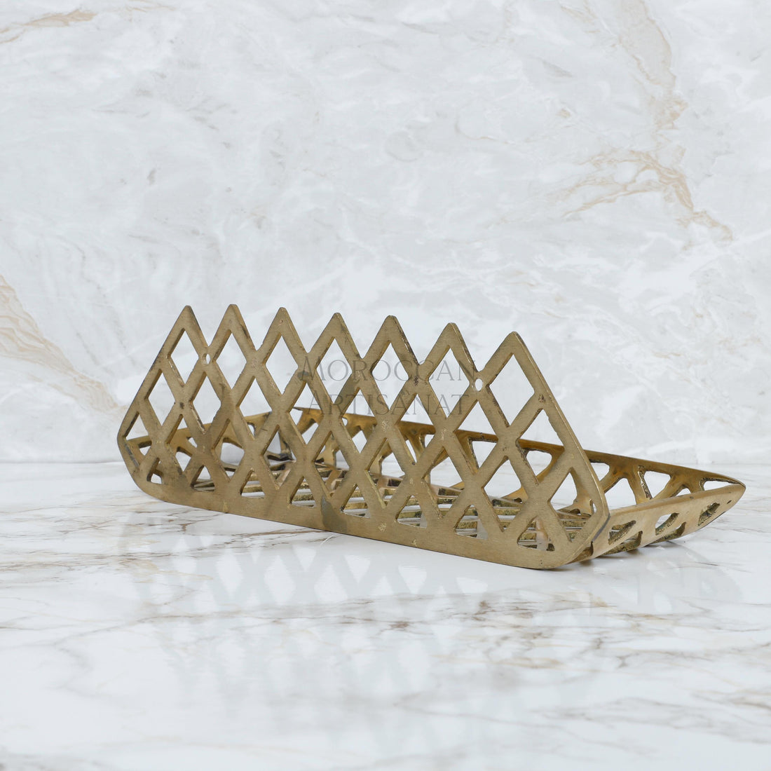 a metal object on a marble surface