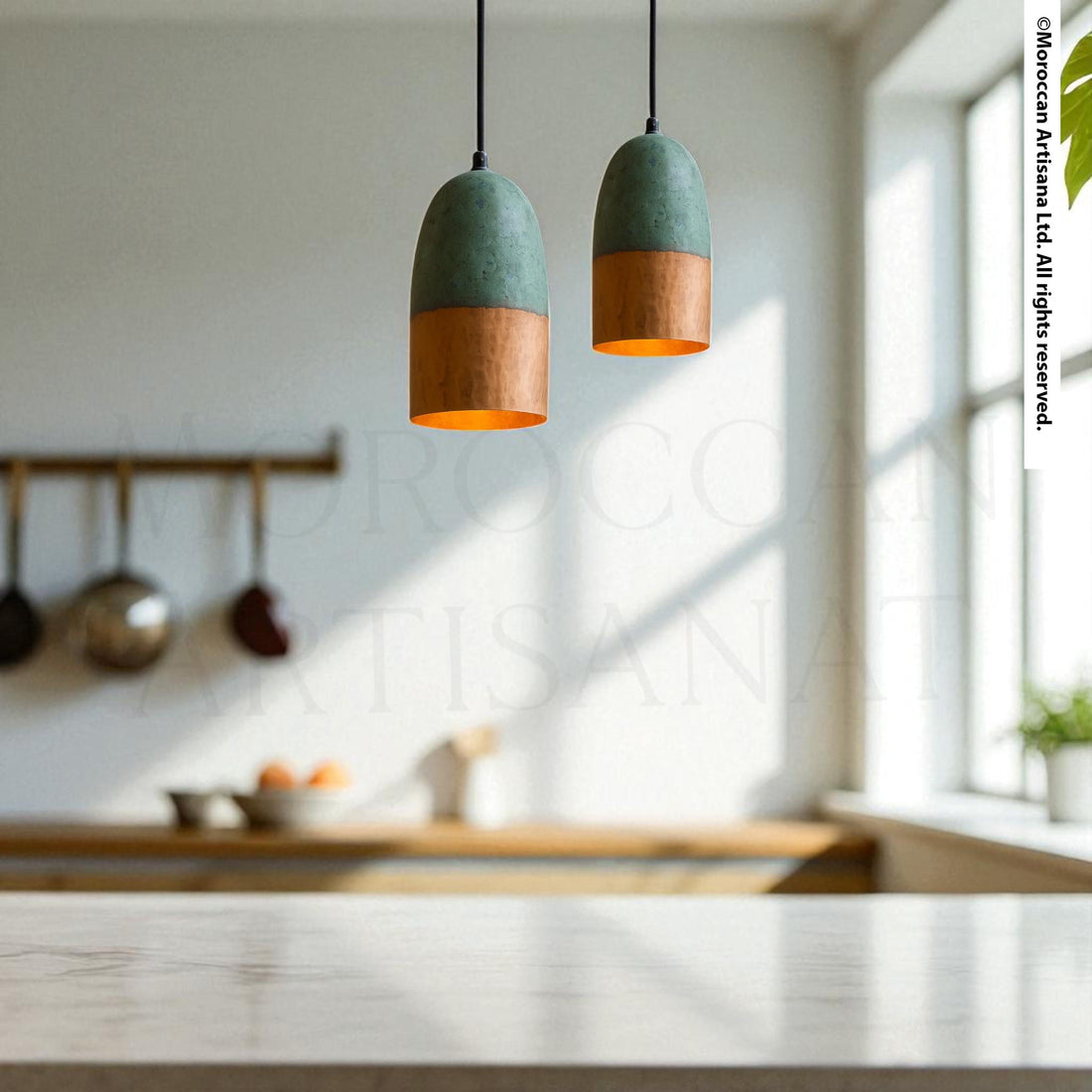 a modern kitchen with a white countertop and a hanging pendant light with a green and orange color scheme.
