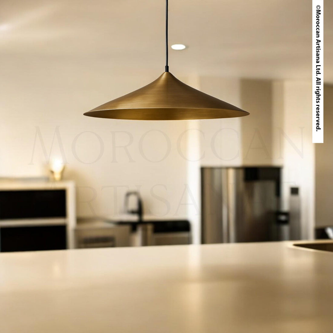 a modern kitchen with a large pendant light hanging above a countertop.