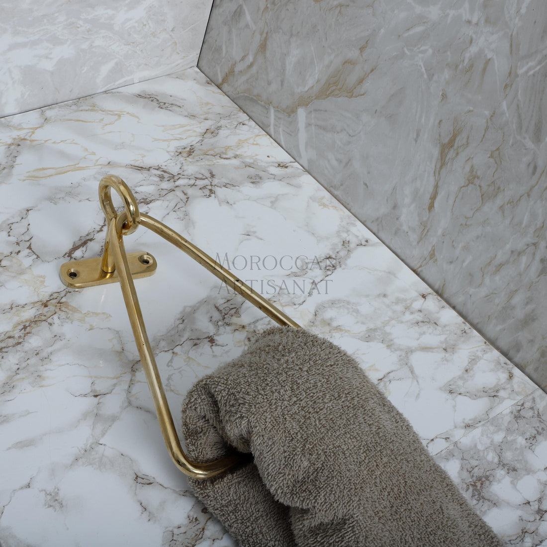 a pair of gloves sitting on top of a marble counter