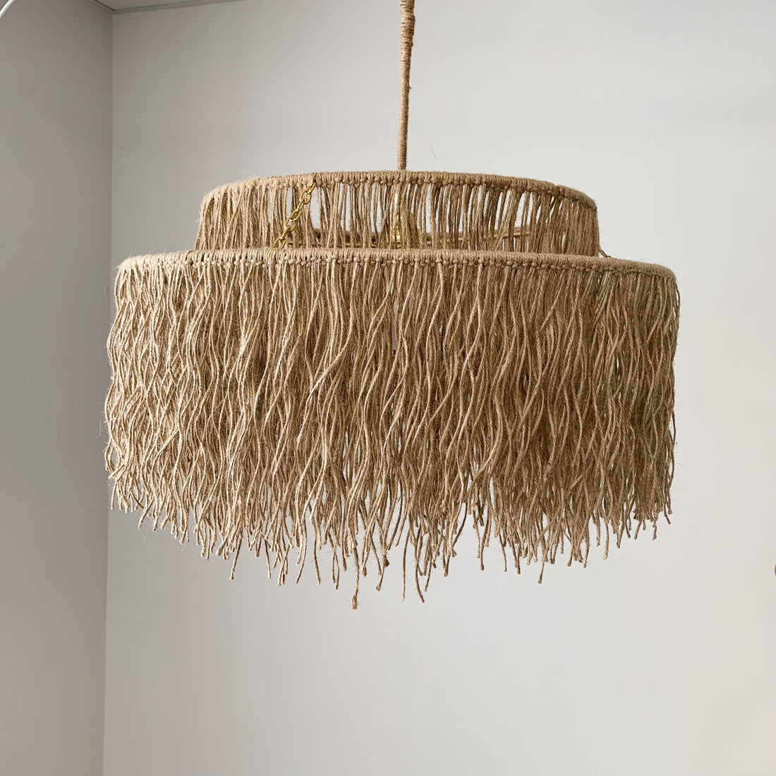 Boho pendant light with natural materials and soft glow for cozy home decor