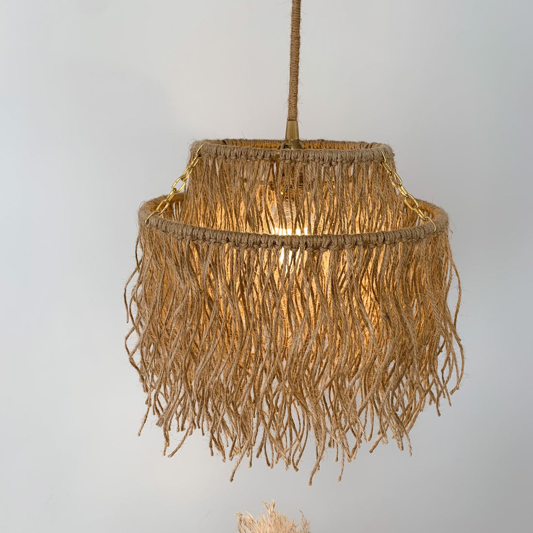 Boho pendant light with natural materials and soft glow for cozy home decor