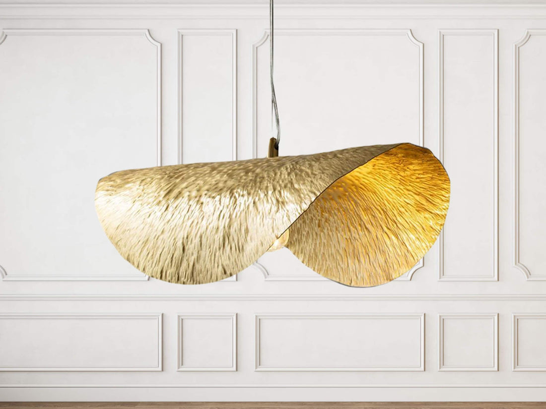 Brass leaf pendant light with intricate design for elegant and nature-inspired decor