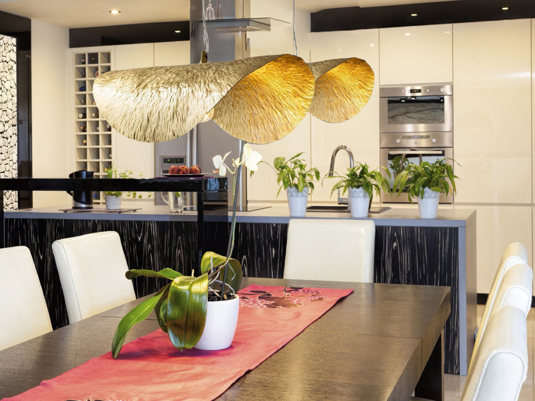 Brass leaf pendant light with intricate design for elegant and nature-inspired decor