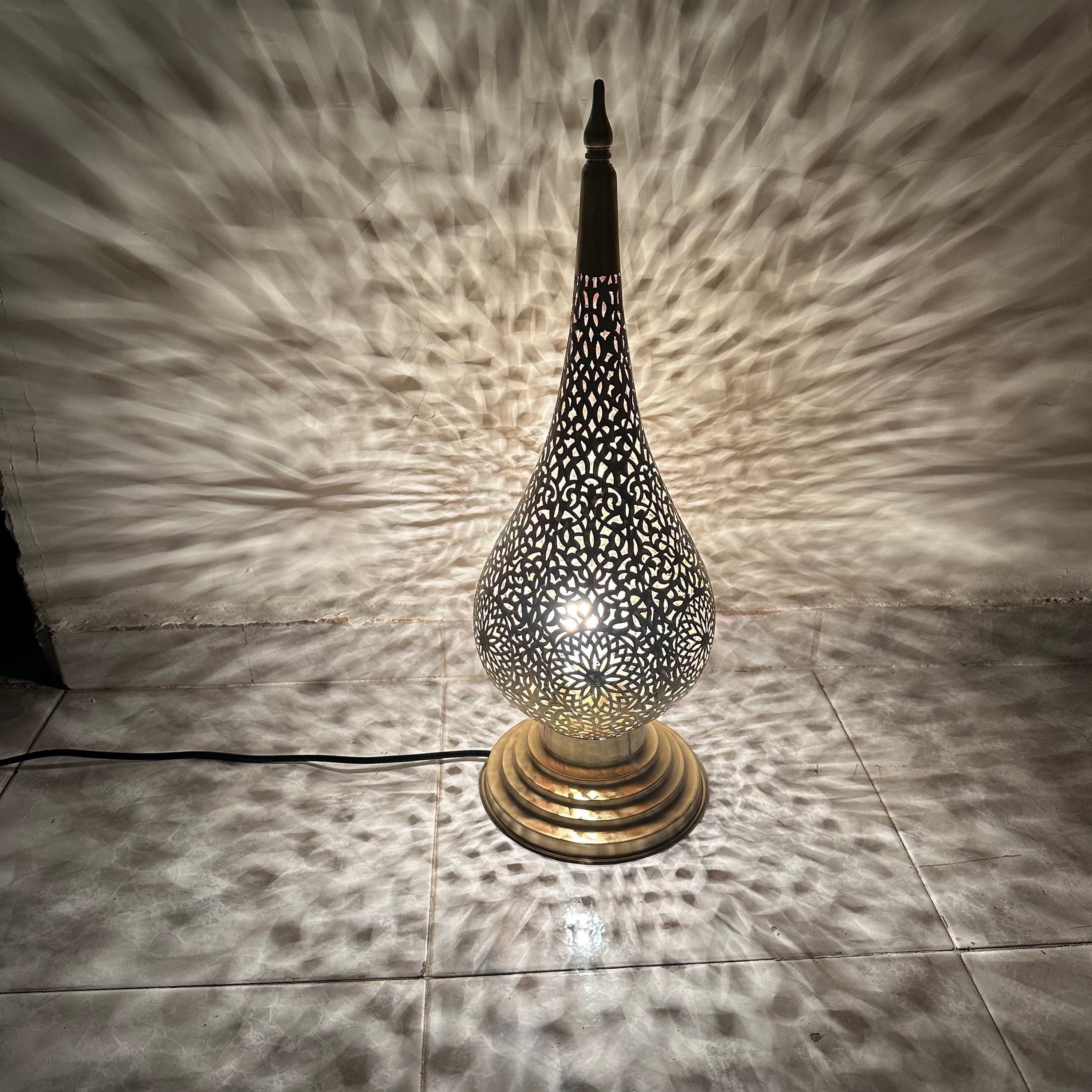 Handcrafted Moroccan brass floor lamp with floral cutout design

