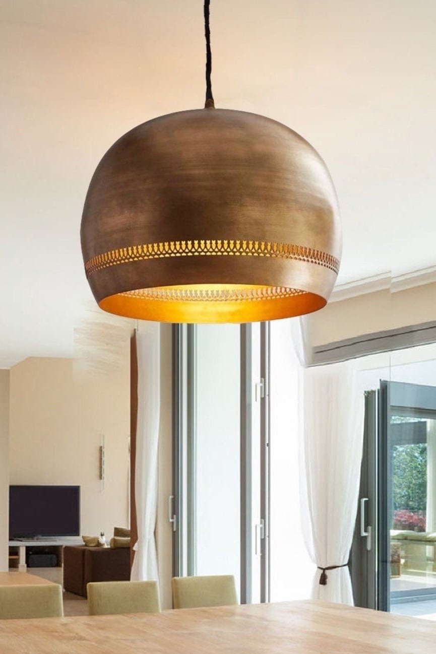 Elegant brass dome pendant light with polished finish for modern or classic decor