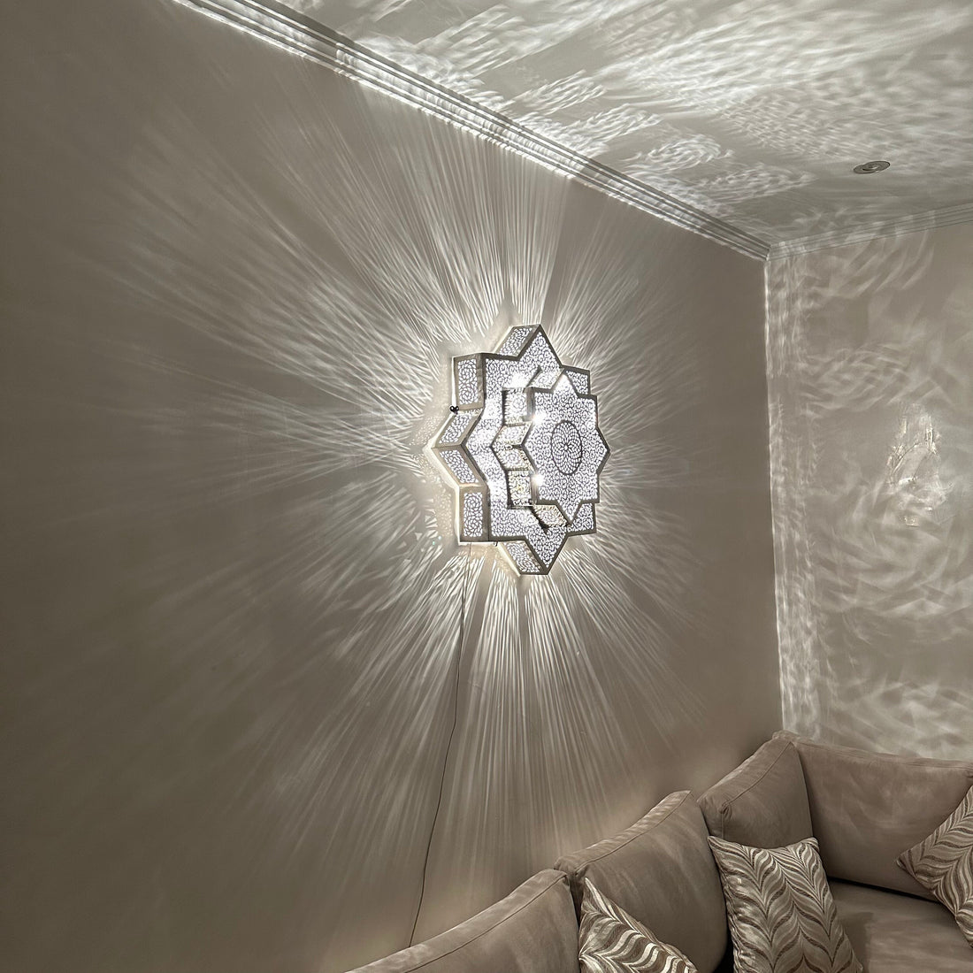 Handcrafted Moroccan brass sconce lighting with intricate patterns for warm and elegant decor