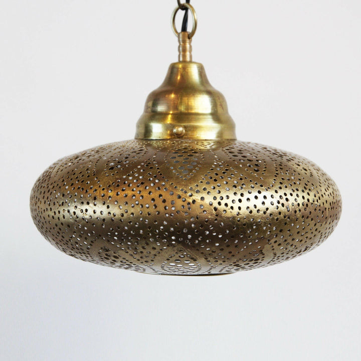 Handcrafted Moroccan brass ceiling light with intricate patterns for warm and stylish home lighting