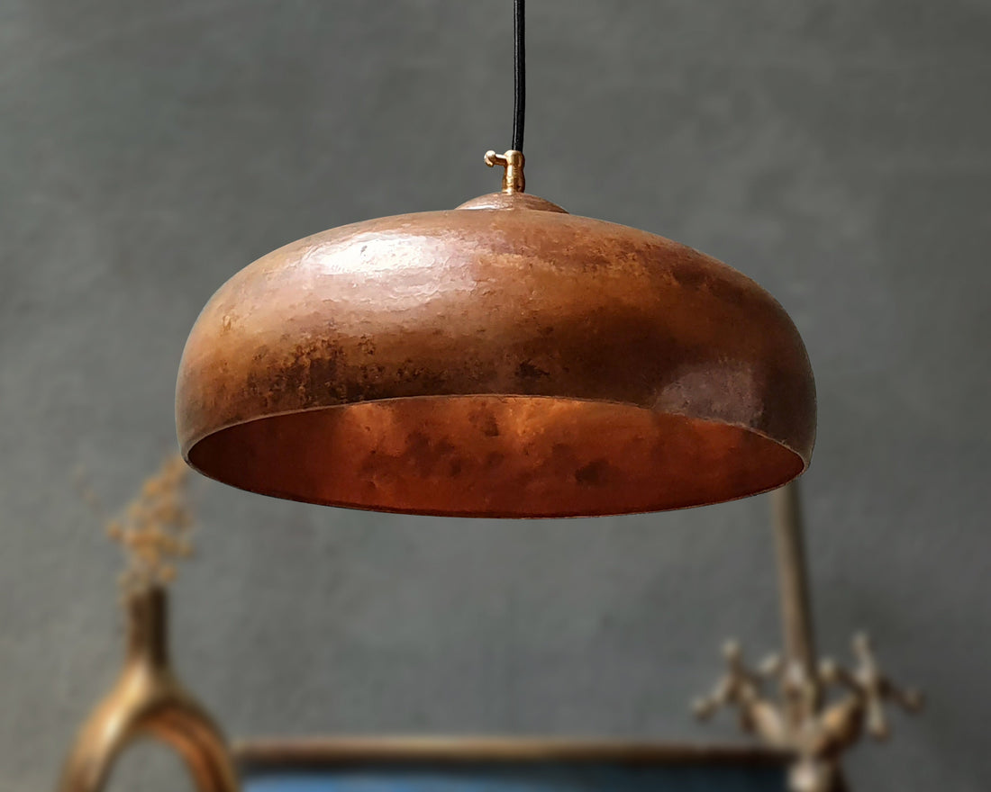 Modern copper pendant light with a sleek design for a warm ambiance