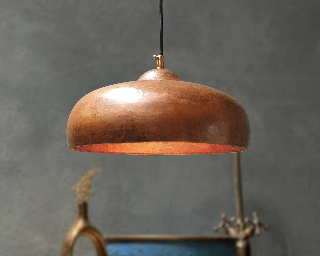 Modern copper pendant light with a sleek design for a warm ambiance