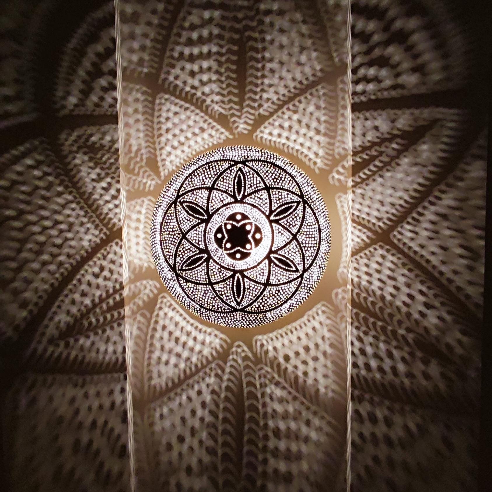 Elegant brushed brass pendant light with warm glow for modern home decor