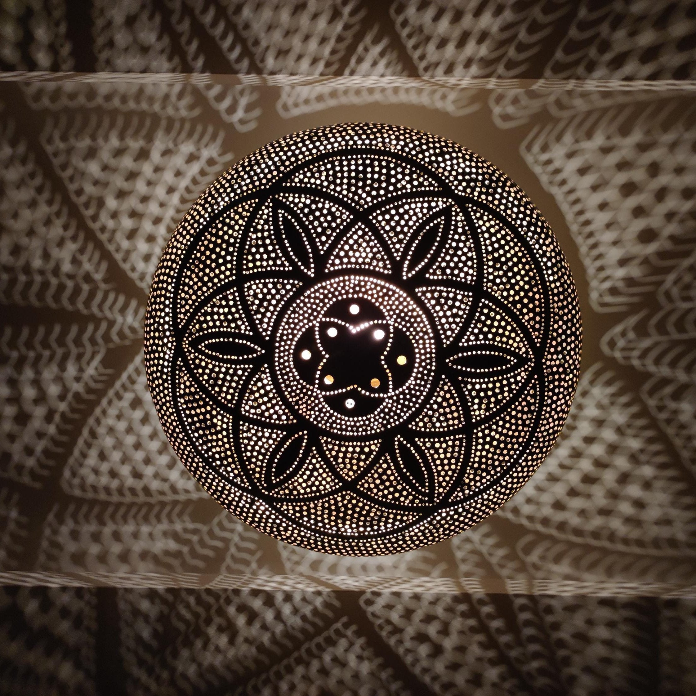 Elegant brushed brass pendant light with warm glow for modern home decor