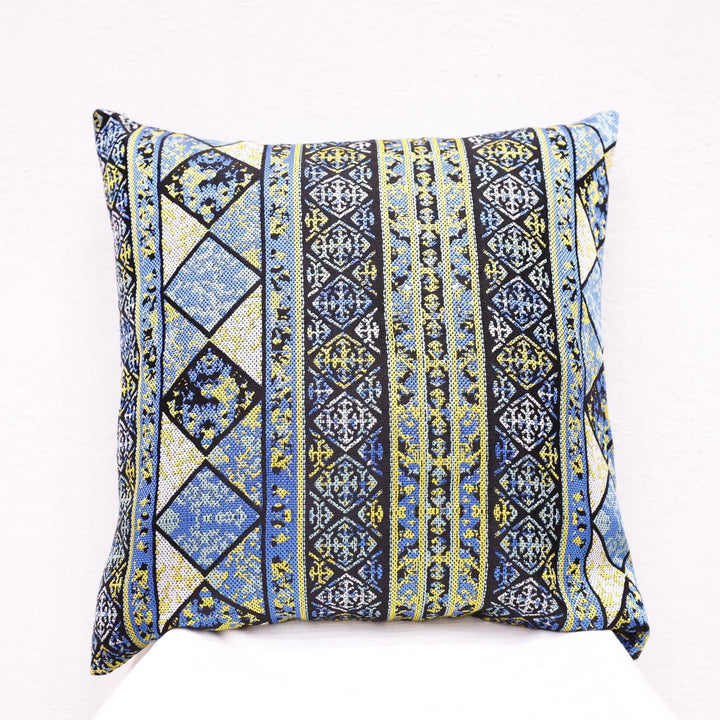 Eco-friendly boho pillow cover in a rustic living room.