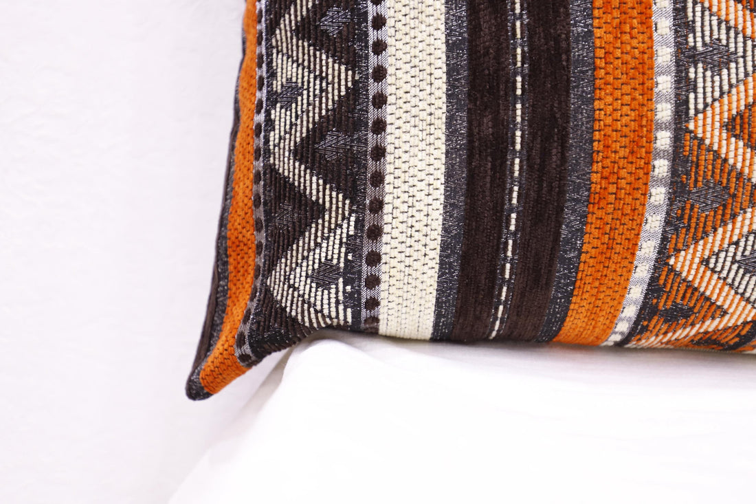 Eco-friendly handcrafted Moroccan pillow close-up showcasing patterns.