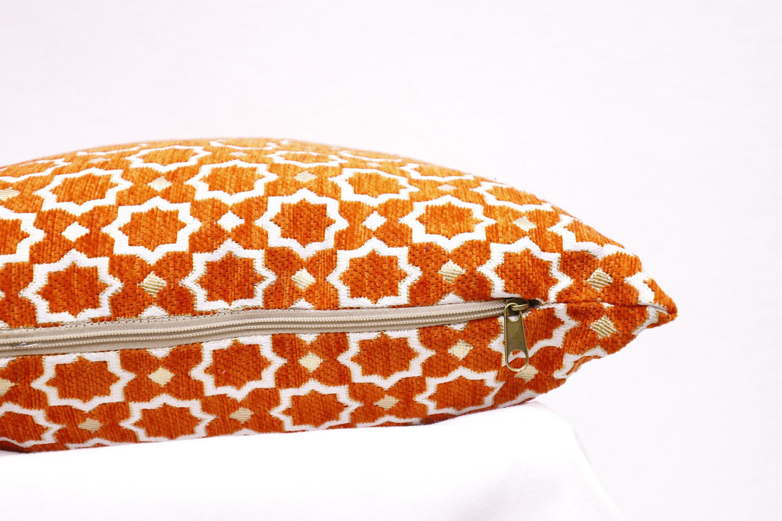 Machine-washable Moroccan-inspired pillow cover.
