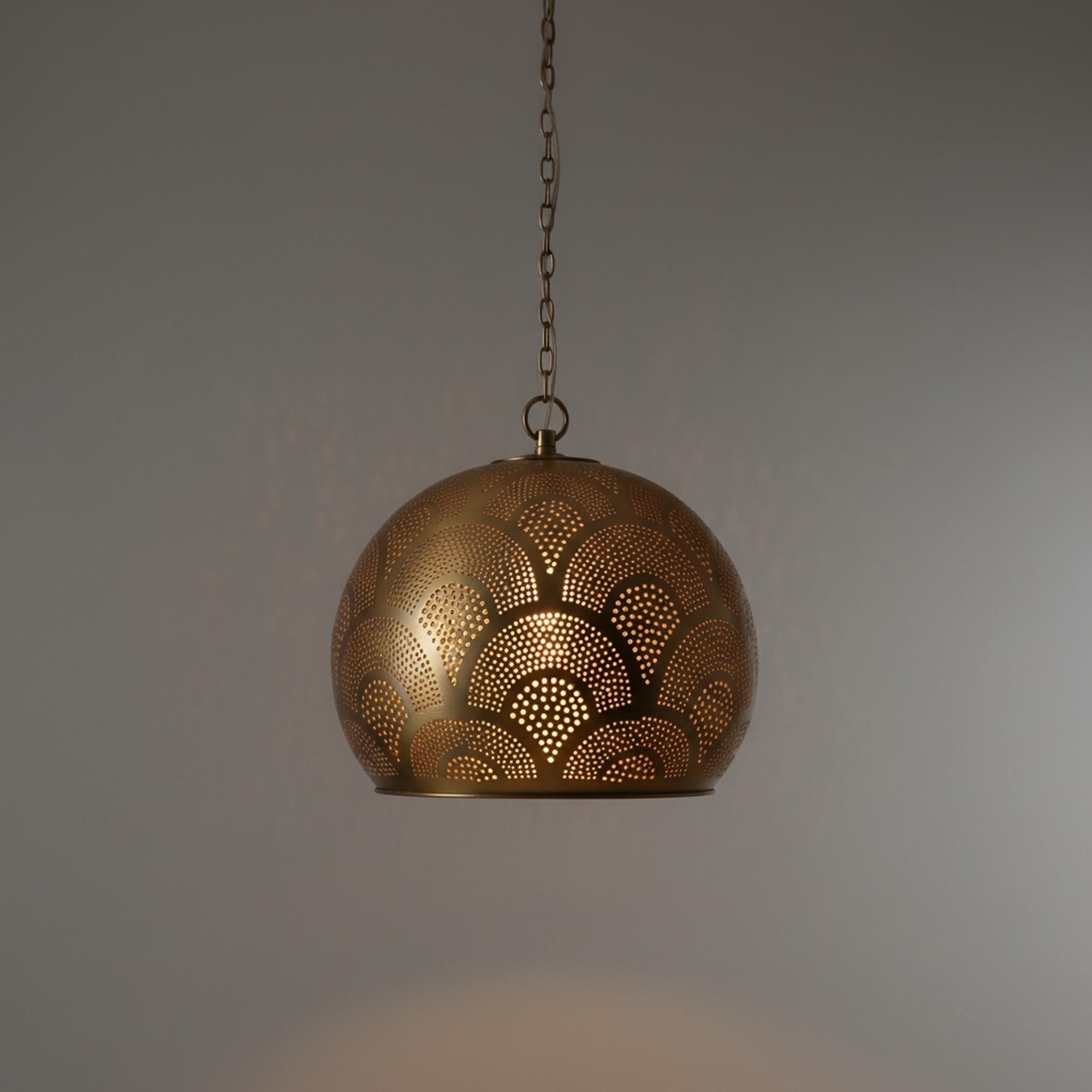 brass globe pendant light perforated patterned hanging chain lamp