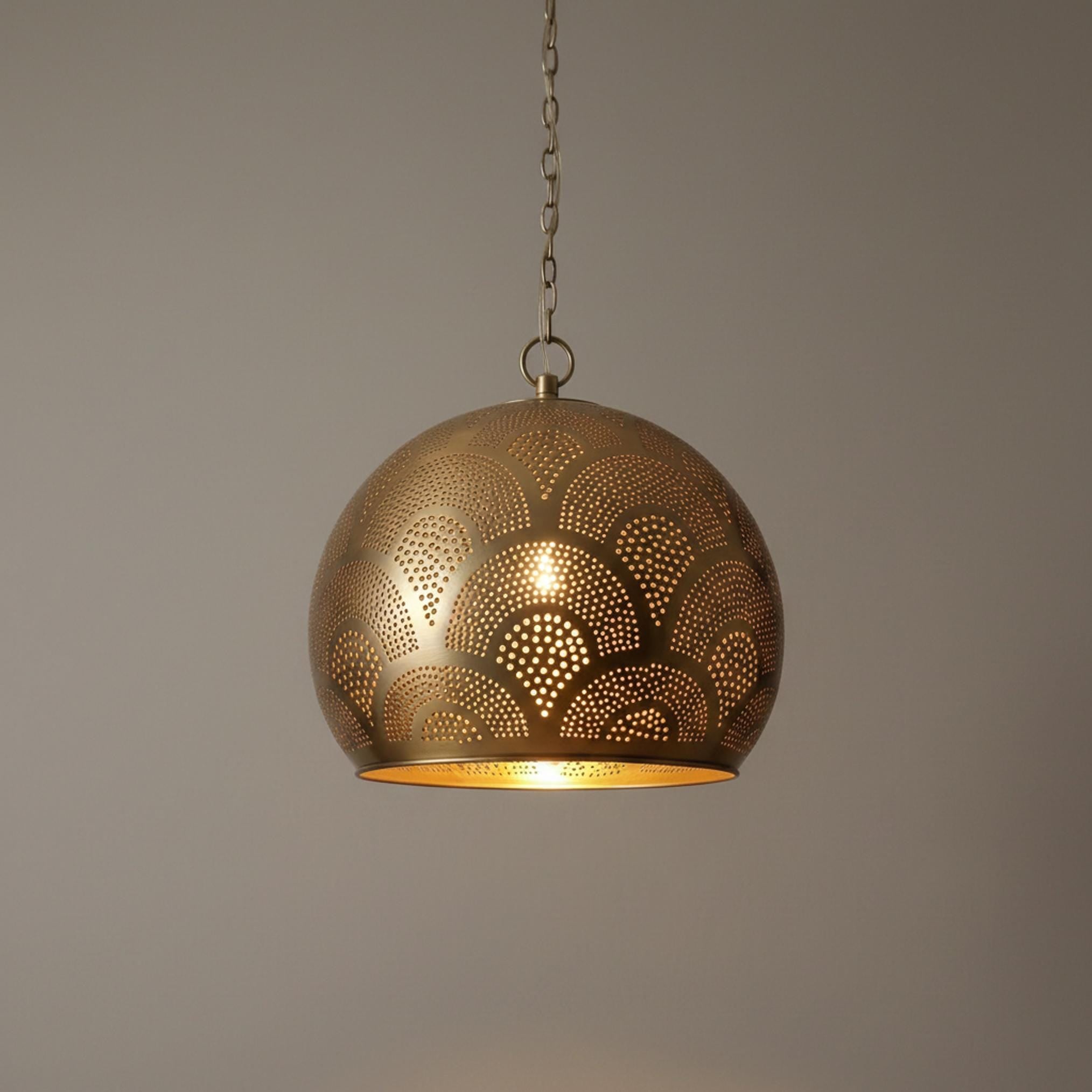 brass globe pendant light perforated patterned hanging chain lamp